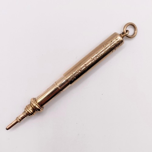404 - A 9ct gold extending pencil, 12 g all in