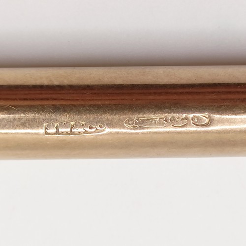 404 - A 9ct gold extending pencil, 12 g all in