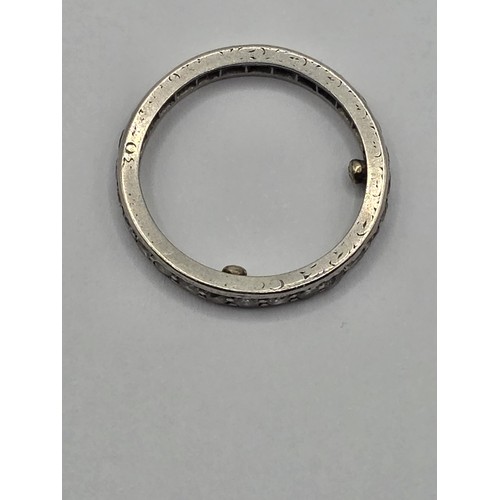 419 - A platinum and diamond full eternity ring, with spacers, ring size J