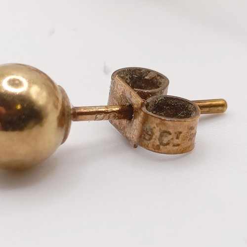 414 - ***Regretfully Withdrawn*** A yellow coloured metal and pearl bar brooch, four pairs of stud earring... 