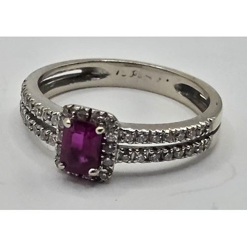 430 - An 18ct gold, ruby and diamond ring, ring size J