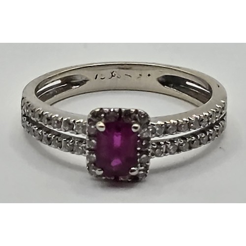 430 - An 18ct gold, ruby and diamond ring, ring size J