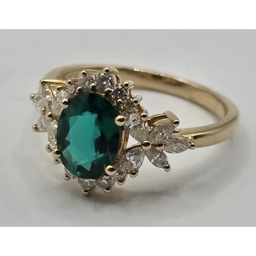 442 - A 10ct gold, emerald and diamond ring, ring size L, emerald 1.5 ct approx., diamonds 0.562 ct approx... 