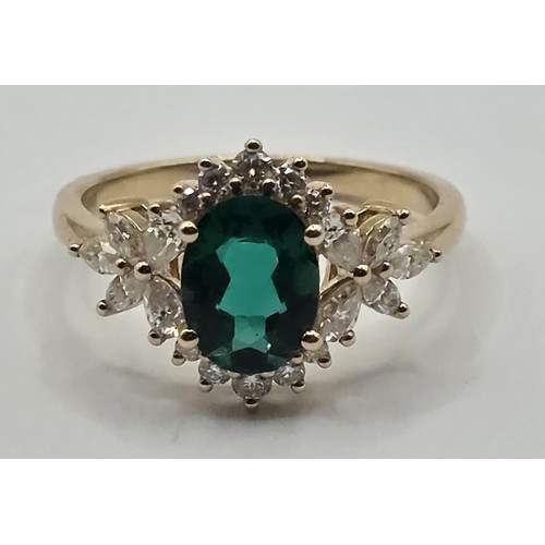 442 - A 10ct gold, emerald and diamond ring, ring size L, emerald 1.5 ct approx., diamonds 0.562 ct approx... 