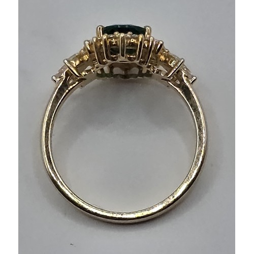 442 - A 10ct gold, emerald and diamond ring, ring size L, emerald 1.5 ct approx., diamonds 0.562 ct approx... 