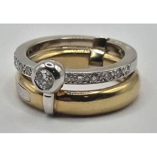 443 - An 18ct gold and diamond Baraca ring, ring size K