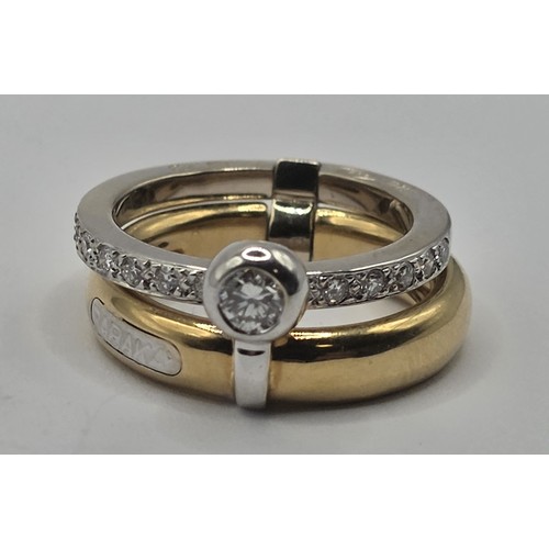 443 - An 18ct gold and diamond Baraca ring, ring size K