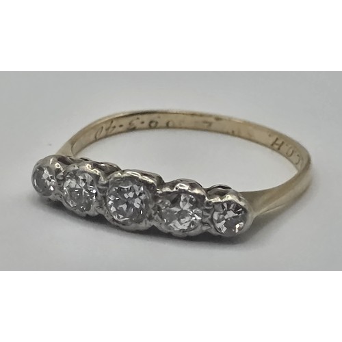 452 - An 18ct gold and five stone diamond ring, ring size J
