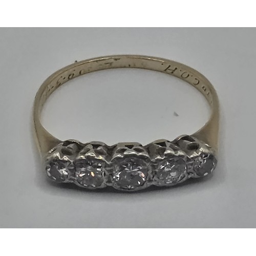452 - An 18ct gold and five stone diamond ring, ring size J
