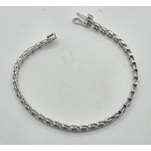 453 - An 19ct white gold and diamond bracelet, diamond weight approx. 1ct