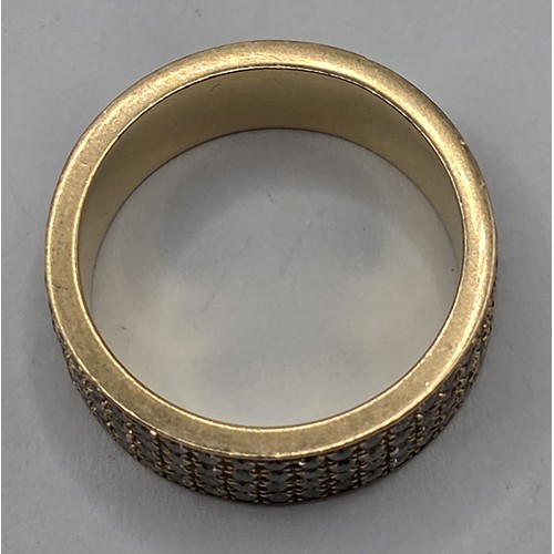 454 - An 18ct gold and diamond four row eternity ring, ring size P