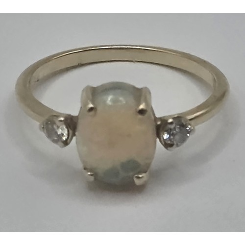 475 - A 14ct gold, opal and diamond ring, ring size L