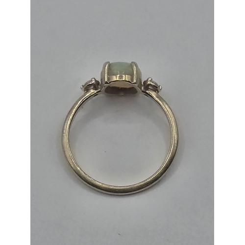 475 - A 14ct gold, opal and diamond ring, ring size L