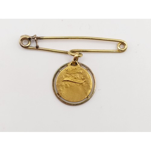 429 - A yellow coloured metal bracelet, testing as 9ct and a 9ct gold St Christopher, 14.1 g