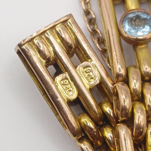 422 - A 9ct gold, aquamarine and sapphire bracelet, 17 g