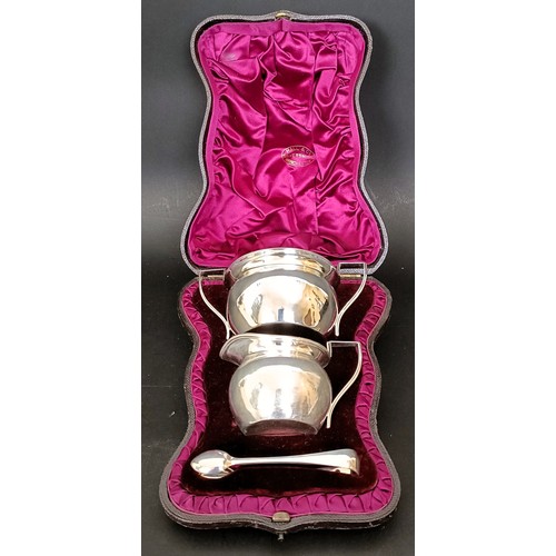 24 - A Victorian silver strawberry set, comprising a sugar bowl, sugar tongs, and matching cream jug, She... 