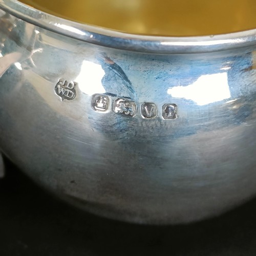 24 - A Victorian silver strawberry set, comprising a sugar bowl, sugar tongs, and matching cream jug, She... 