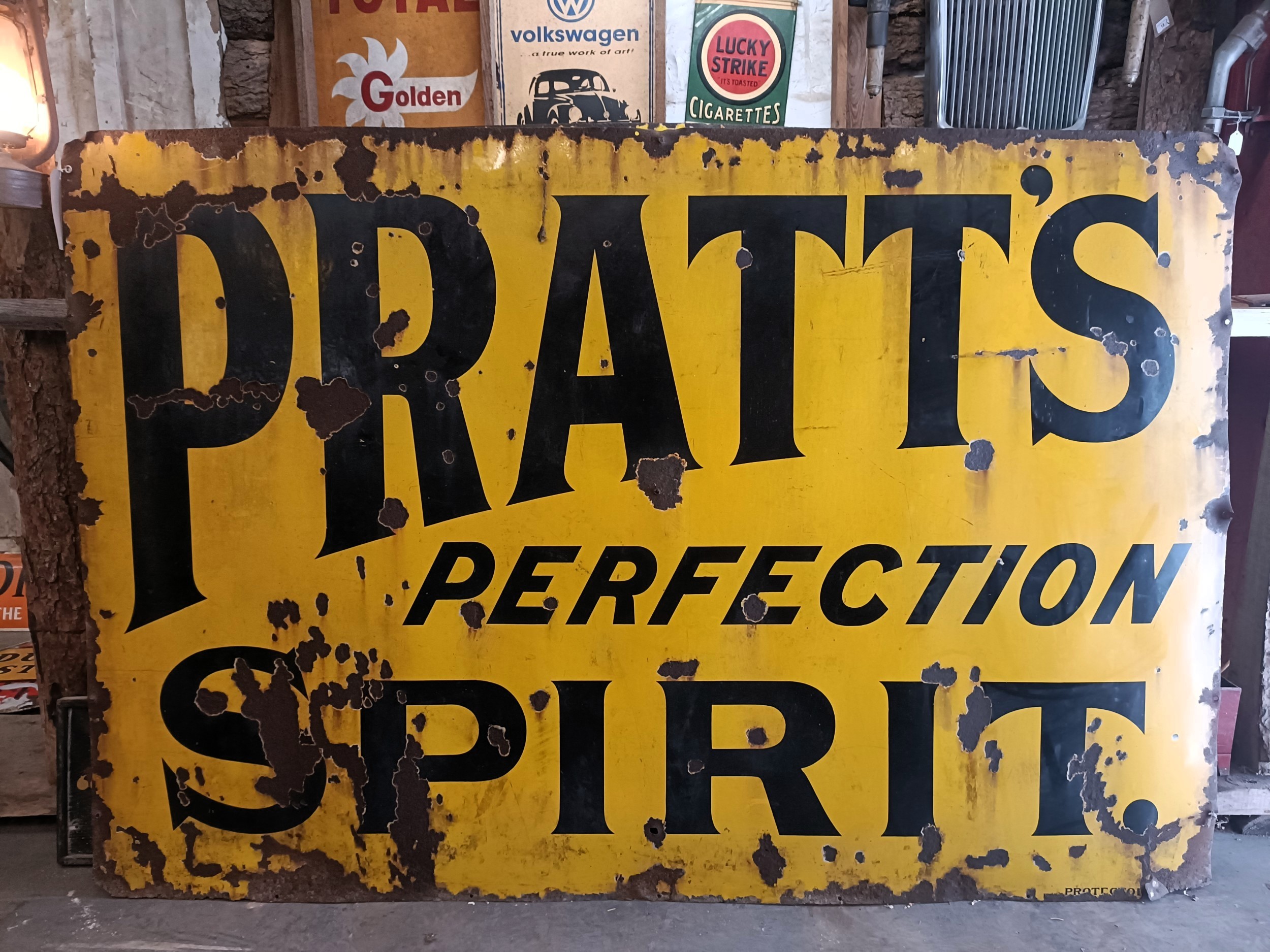 A large enamel sign, Pratt's Perfection Spirit, 121 x 183 cm