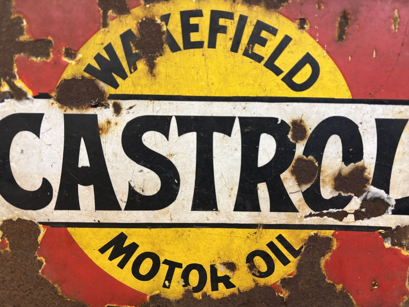 A flanged double sided enamel sign, Castrol Wakefield Motor Oil, 34 x 51 cm