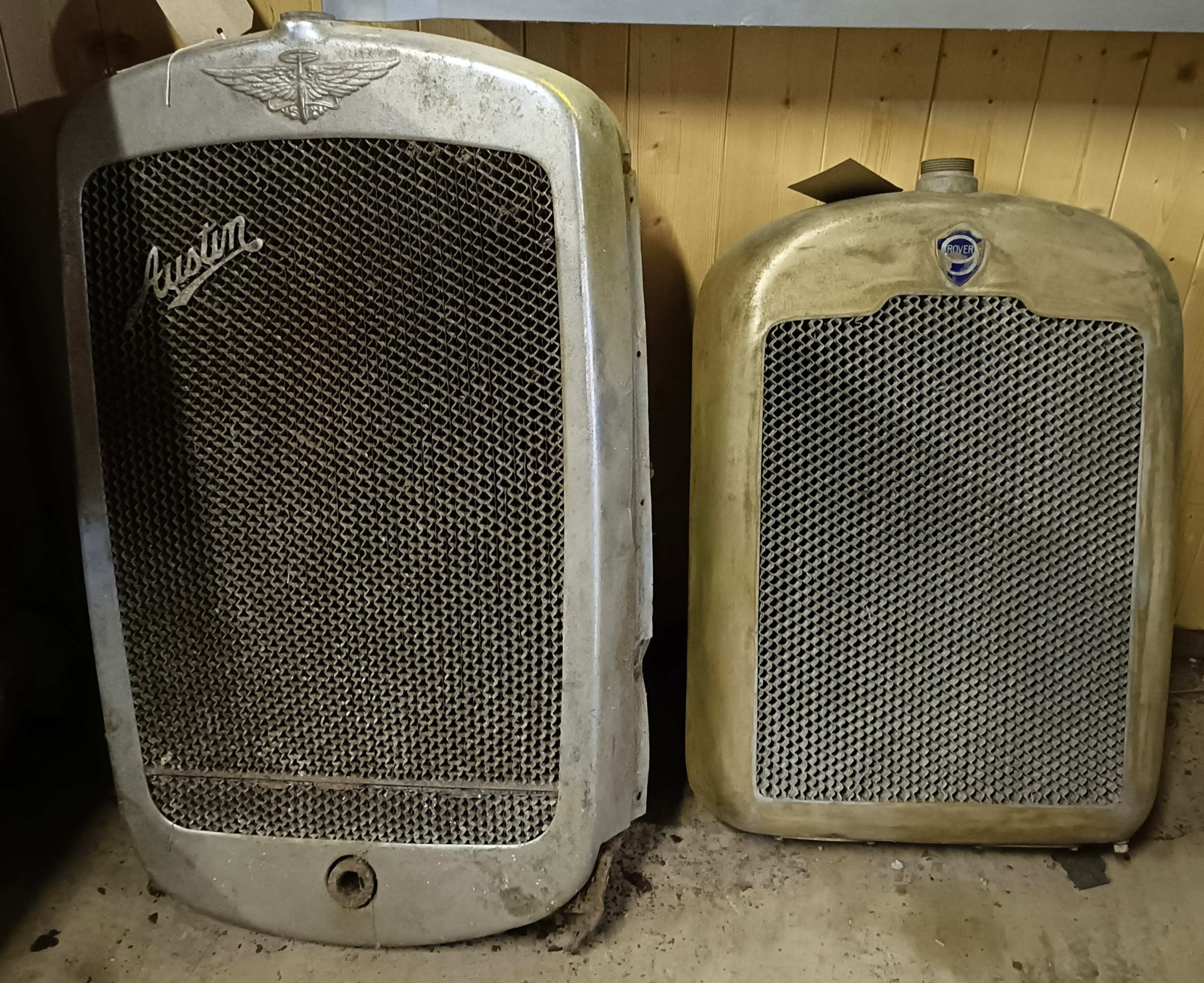 An Austin radiator and surround, 74 cm high, and a Rover radiator and ...