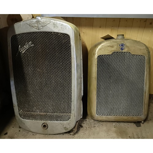 An Austin radiator and surround, 74 cm high, and a Rover radiator and ...