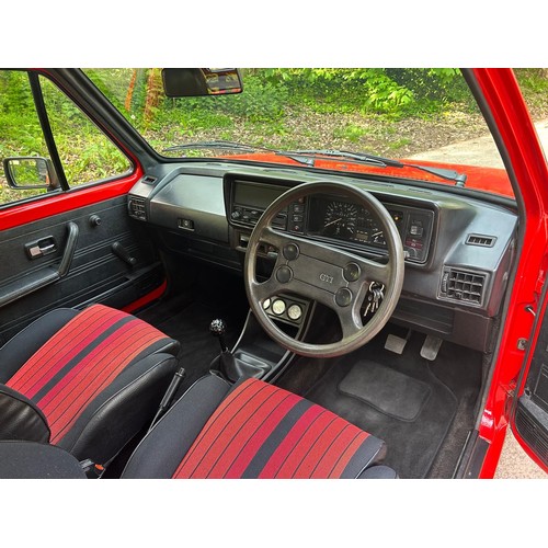 54 - 1983 VW Golf GTi Mk IRegistration number XRM 936YRed with a black and red stripe interiorJust over 1... 