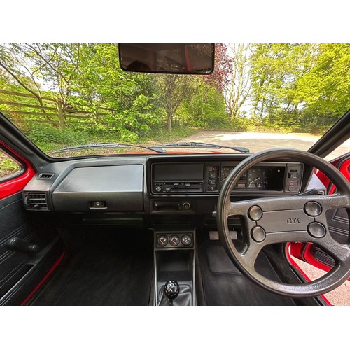 54 - 1983 VW Golf GTi Mk IRegistration number XRM 936YRed with a black and red stripe interiorJust over 1... 