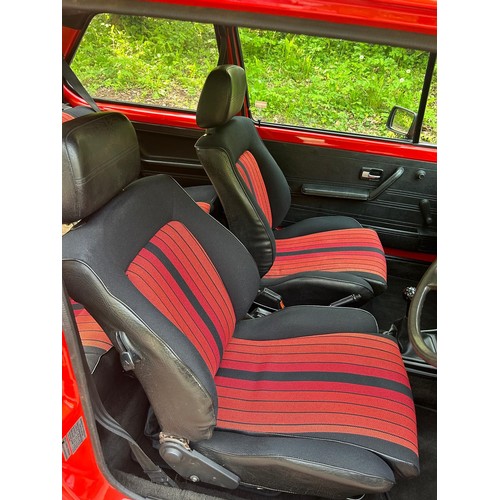 54 - 1983 VW Golf GTi Mk IRegistration number XRM 936YRed with a black and red stripe interiorJust over 1... 