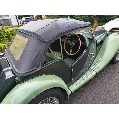 30 - 1954 MG TFRegistration number NWU 579Chassis numberEngine numberTwo tone green with a green leather ... 