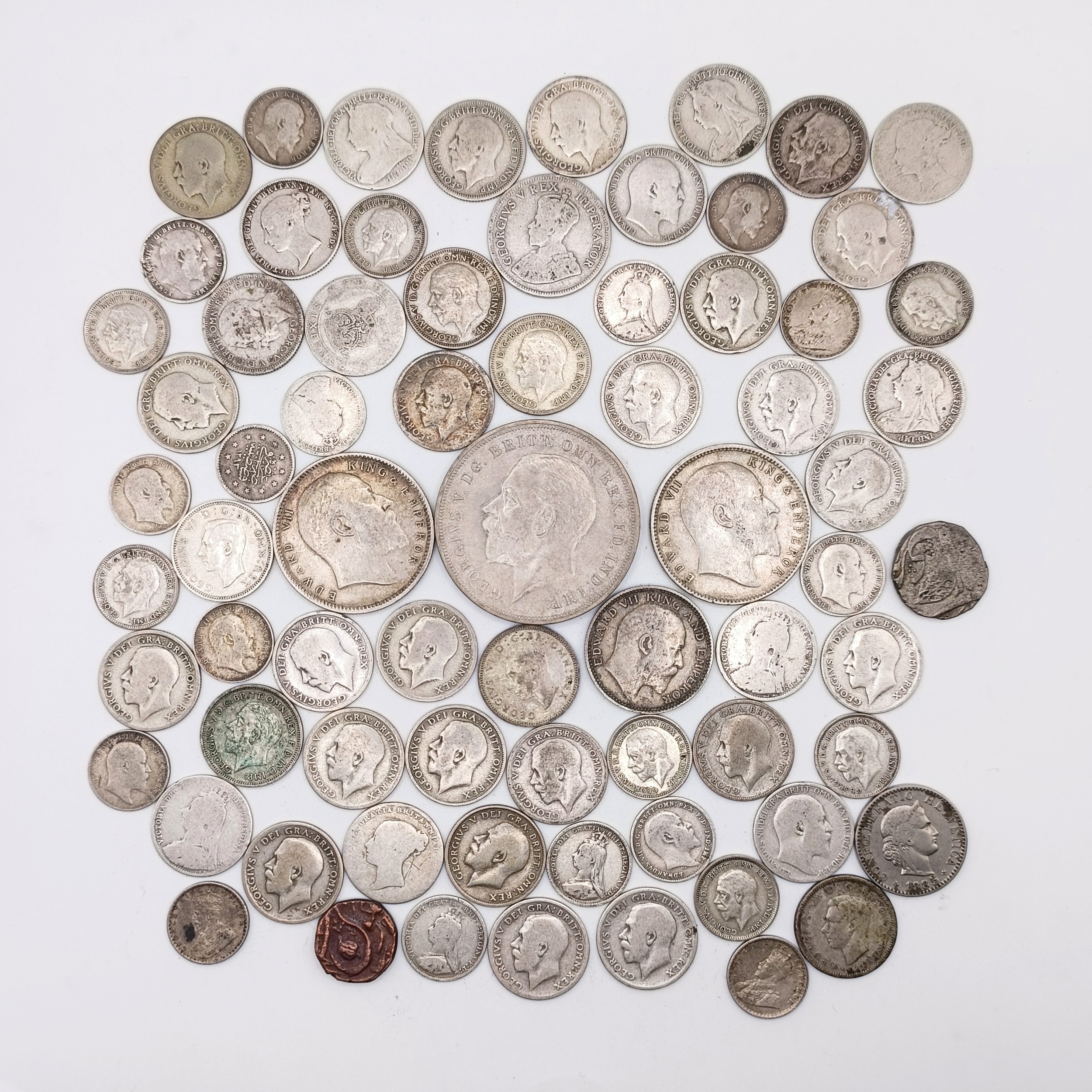 A crown, 1935, two rupees, 1904, and other coins