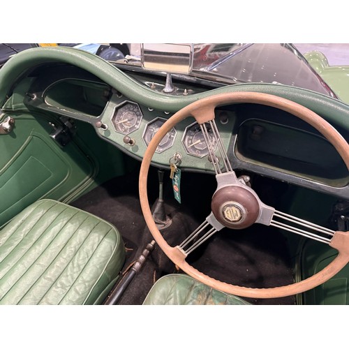 30 - 1954 MG TFRegistration number NWU 579Chassis numberEngine numberTwo tone green with a green leather ... 