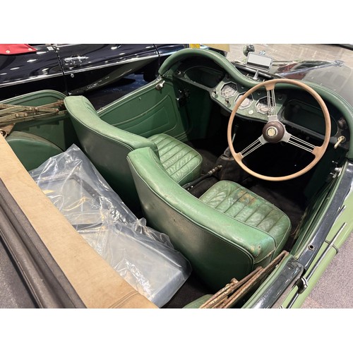 30 - 1954 MG TFRegistration number NWU 579Chassis numberEngine numberTwo tone green with a green leather ... 
