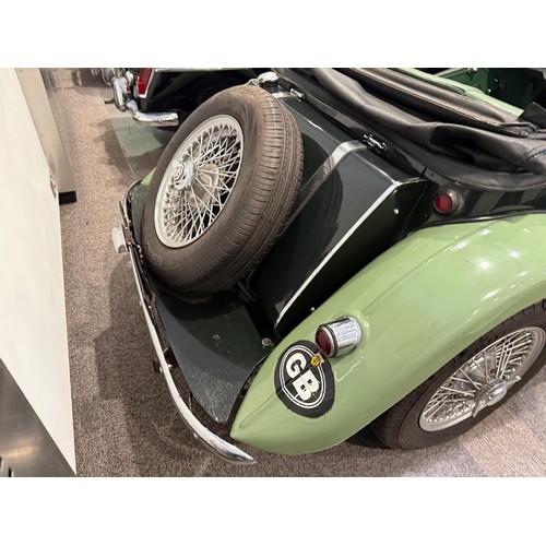 30 - 1954 MG TFRegistration number NWU 579Chassis numberEngine numberTwo tone green with a green leather ... 