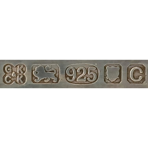 319 - A part table service of plated cutlery, a silver pin dish, and a silver photograph frame...