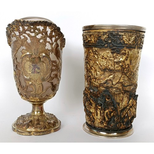 345 - A silver gilt plated milk jug, piered and decorated birds and foliage, with a glass liner, 15 cm hig...