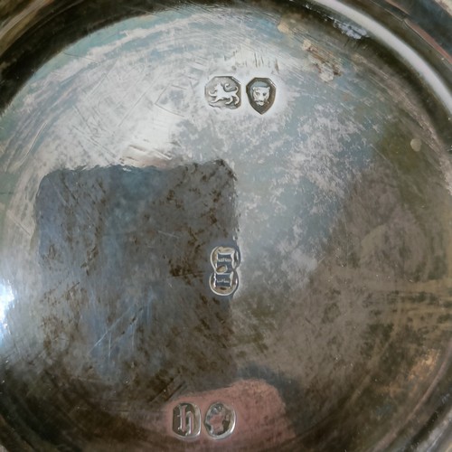 364 - A Victorian silver baluster mug, with embossed decoration, London 1863, 8.6 ozt, 13 cm high...