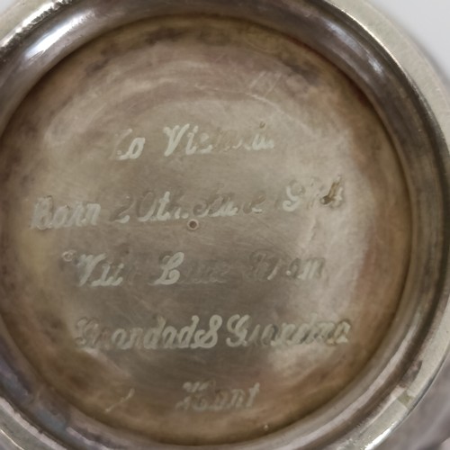 354 - A hammered silver christening type mug, with presentation inscription to the underside, William Neal...