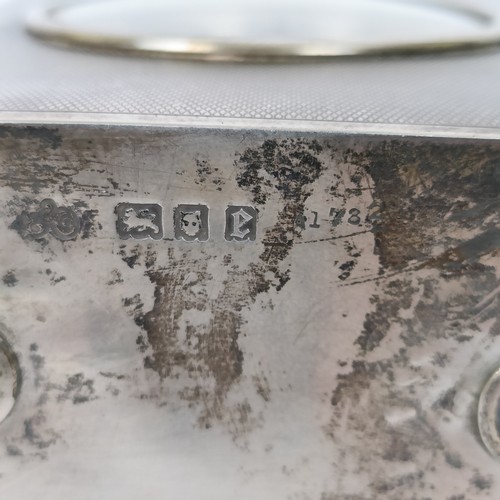 366 - A carriage timepiece, in a silver case, with engine turned decoration, London 1920, 13.5 cm high...