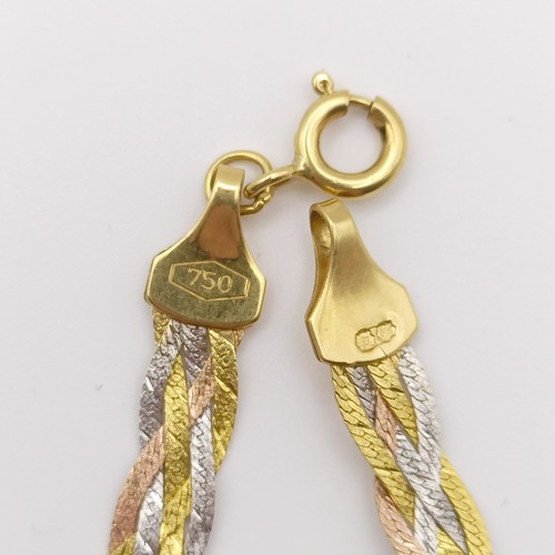 631 - An 18ct three colour gold bracelet, 4.3 g