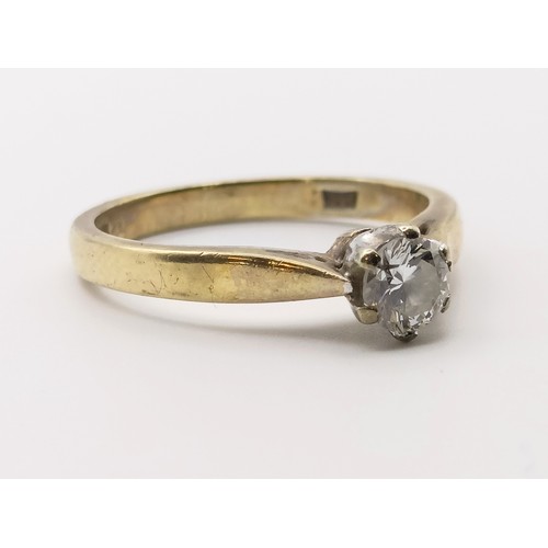 649 - A 9ct gold and solitaire diamond ring, ring size K1/2