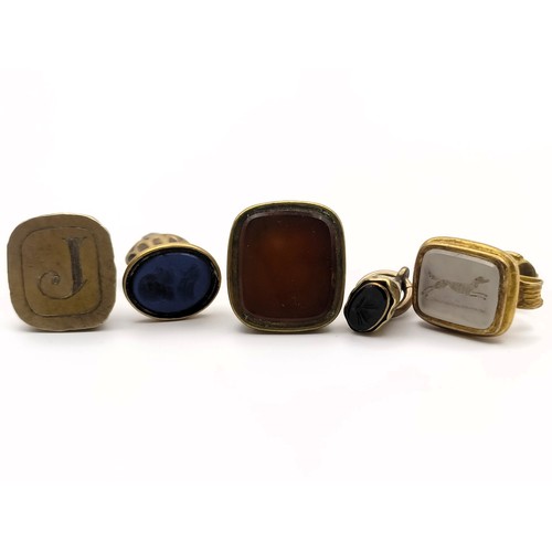 658 - A 19th century seal fob, and four others similar (5)