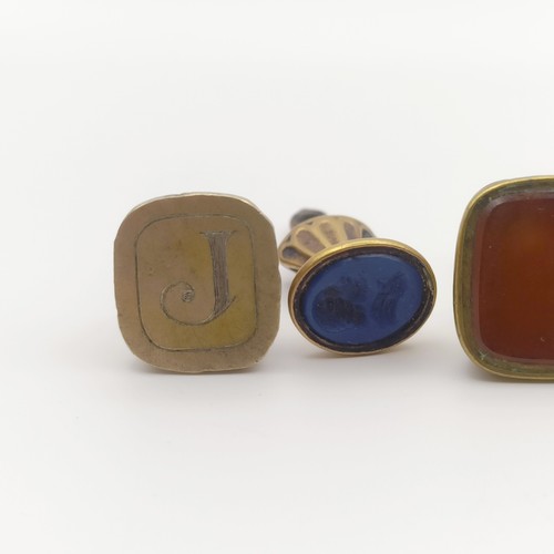 658 - A 19th century seal fob, and four others similar (5)