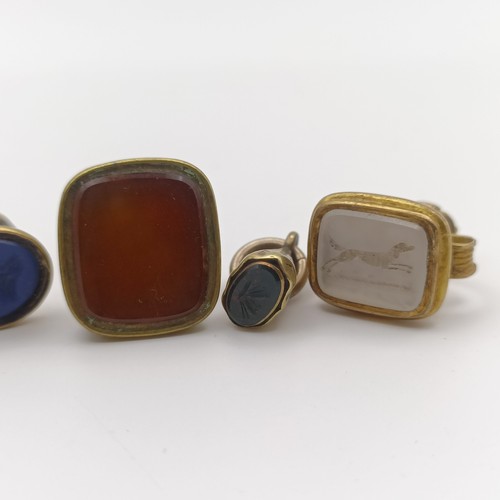 658 - A 19th century seal fob, and four others similar (5)