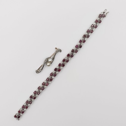 659 - A ruby and diamond bracelet, and a pearl and diamond crossover brooch (2)