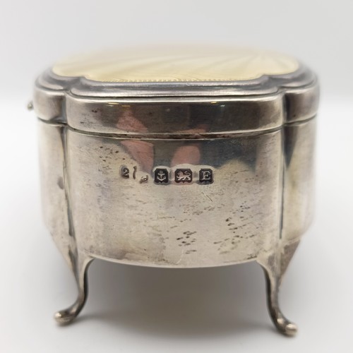 348 - An early 20th century silver and enamel trinket box, of shaped oval form, Birmingham 1929, 11 cm wid...