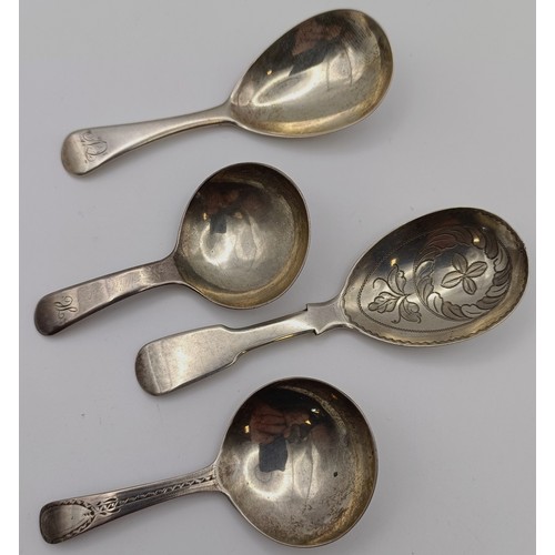 566 - A William IV silver caddy spoon, London 1832, and three others (4)...