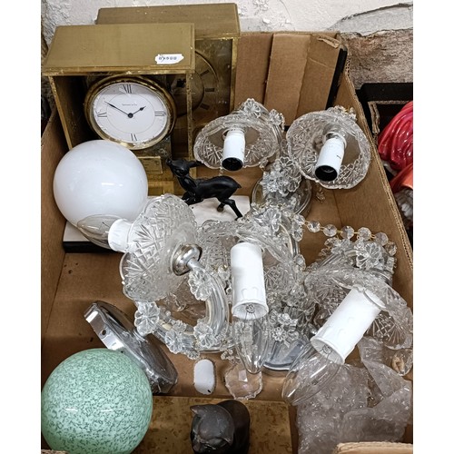 820 - A Tiffany & Co desk timepiece, in a brass case, 23 cm high, a similar clock, three wall sconces,...