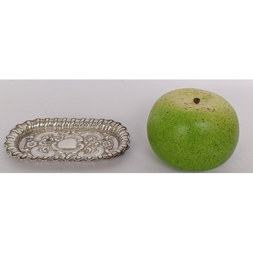 328 - A small embossed silver tray, London 1901, 12 cm wide, and other small items of silver...