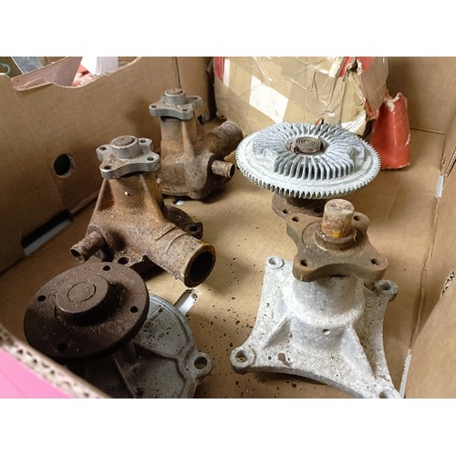 7 - Assorted water pumps, and other parts, including some new old stock (2 boxes)