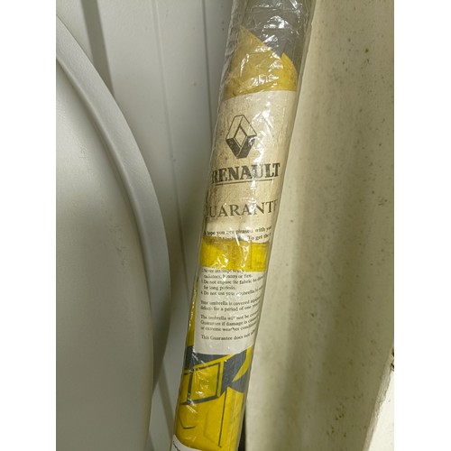 20 - A Lucas auto bulbs garage dispenser, 86 cm high, and a Renault branded umbrella, appears unused (2)